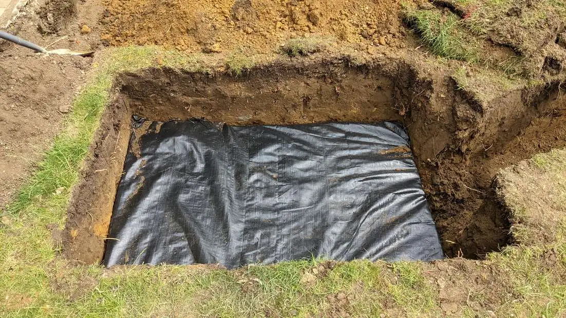 Soakaway in pit